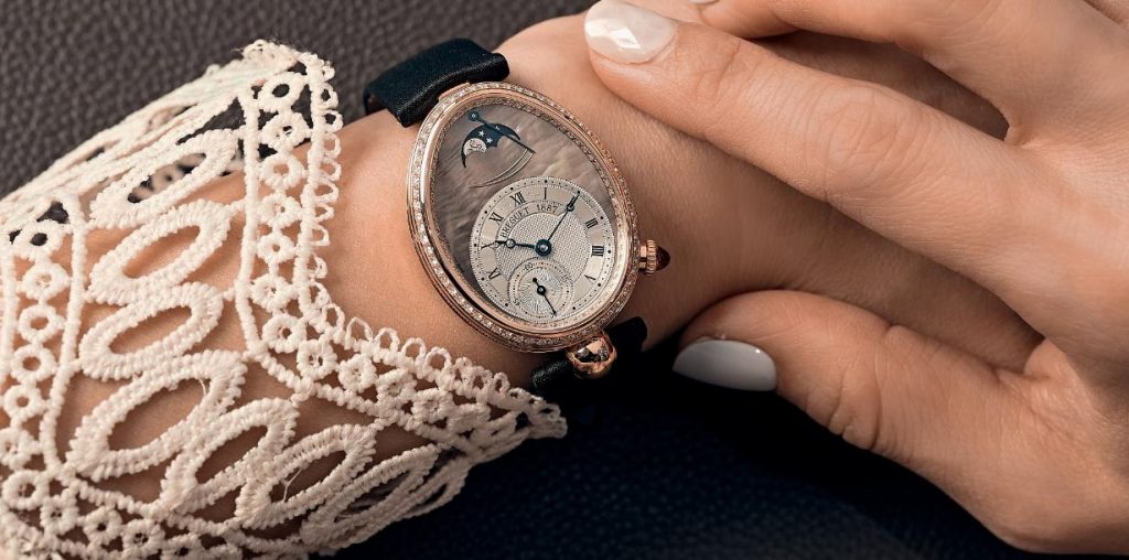 The oval fake Breguet Reine De Naples watches with off-centre dials are suitable for females.