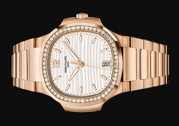 The off-white dial fake watch is decorated with diamonds.